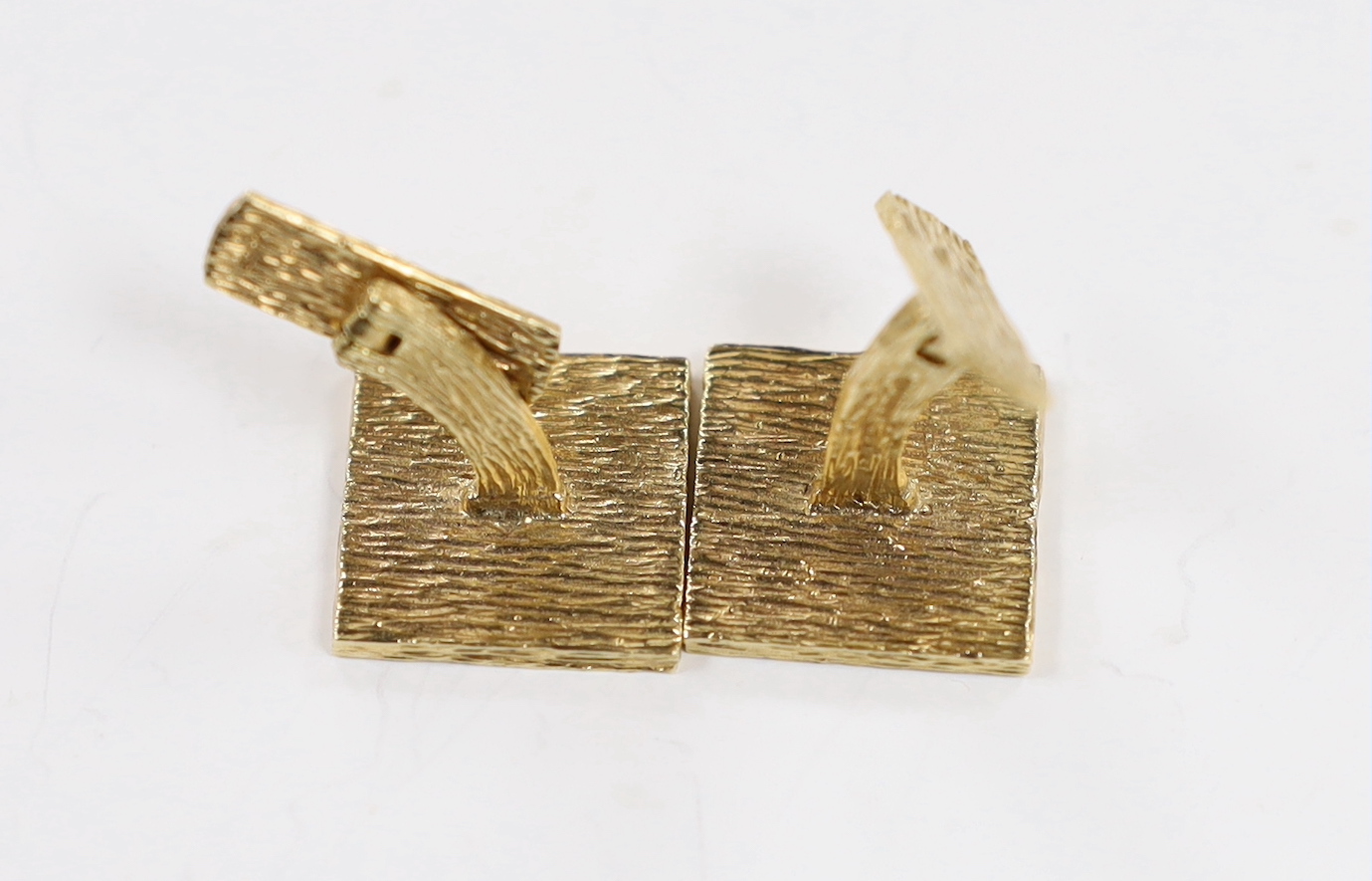 A pair of late 1960's textured 9ct gold square cufflinks, 17mm, 15.6 grams.